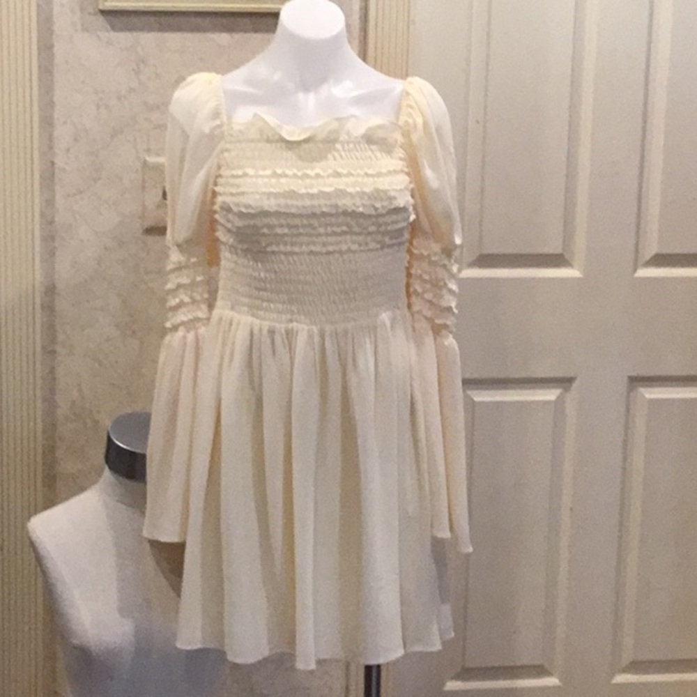 Opt dress brand new with tags a yellowish cream dress  size sm